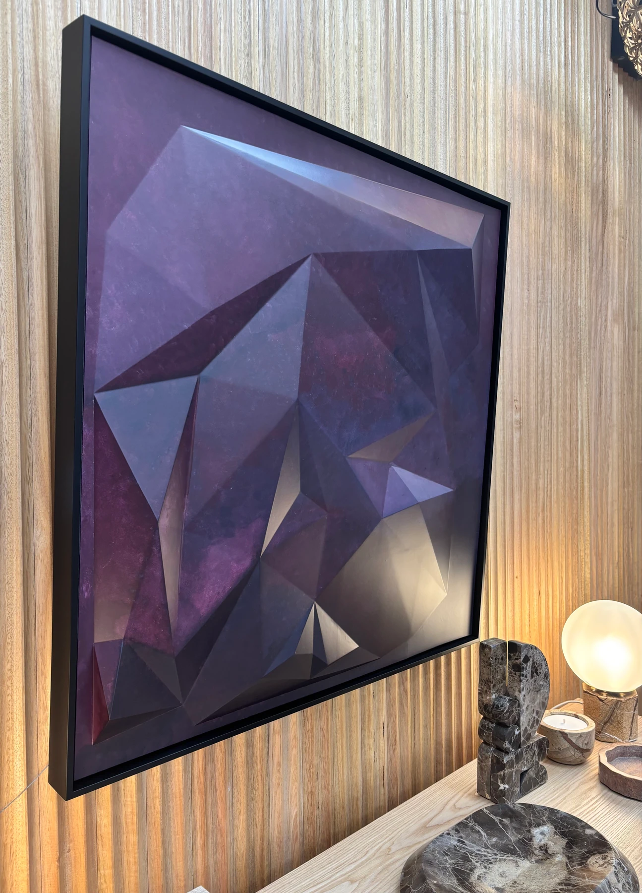 Angled view of Within Colour against a timber wall