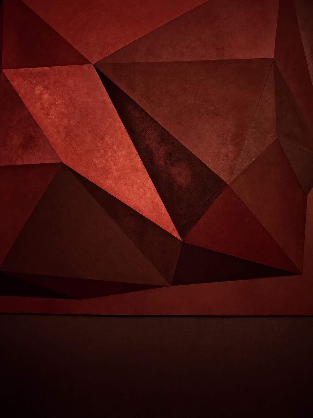 Facet detail under warm red lighting